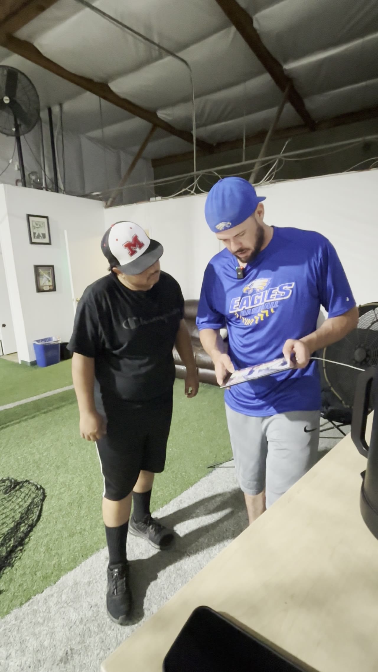 Xabi Iparraguirre reviewing data with a player at The Lab