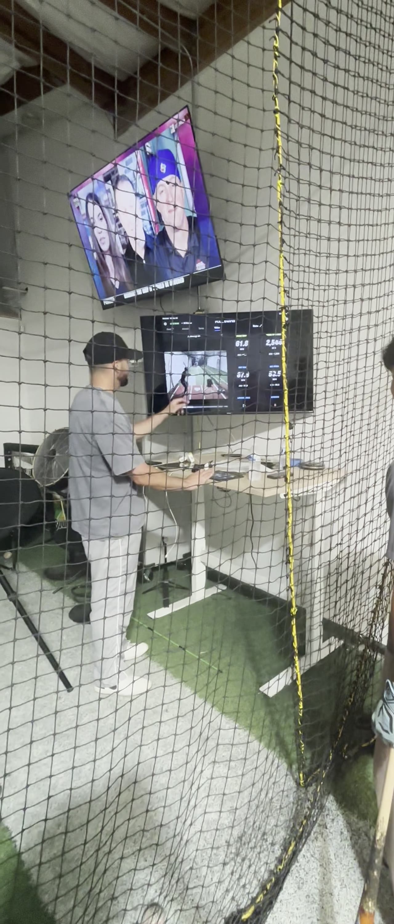 Player reviewing data screens at The Lab